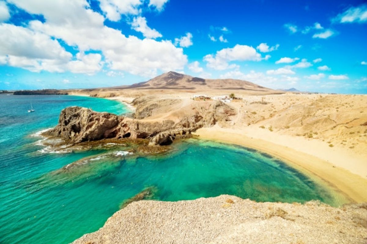 Volcanic landscape of Playa de Papagayo Beach and its rocky terrain in Lazarote