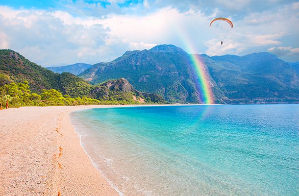 Paraglider over the beach in Turkey