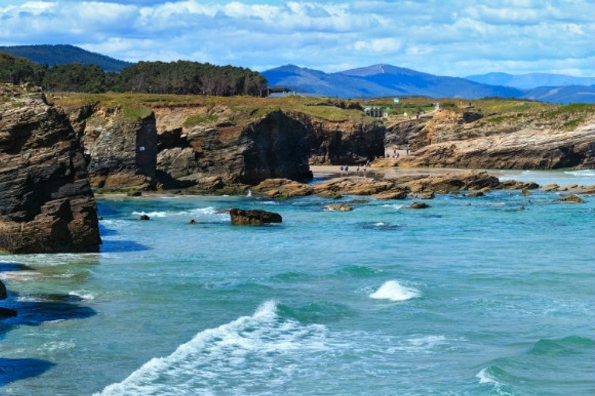 The rocky terrain of the Praia de Augas Galicia Beach in Spain, also known as Beach of Cathedrals.