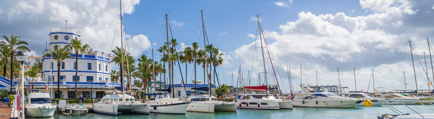 Lighthouse & boats in Estepona port in the Costa del Sol