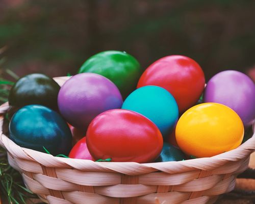Basket full of colored eggs