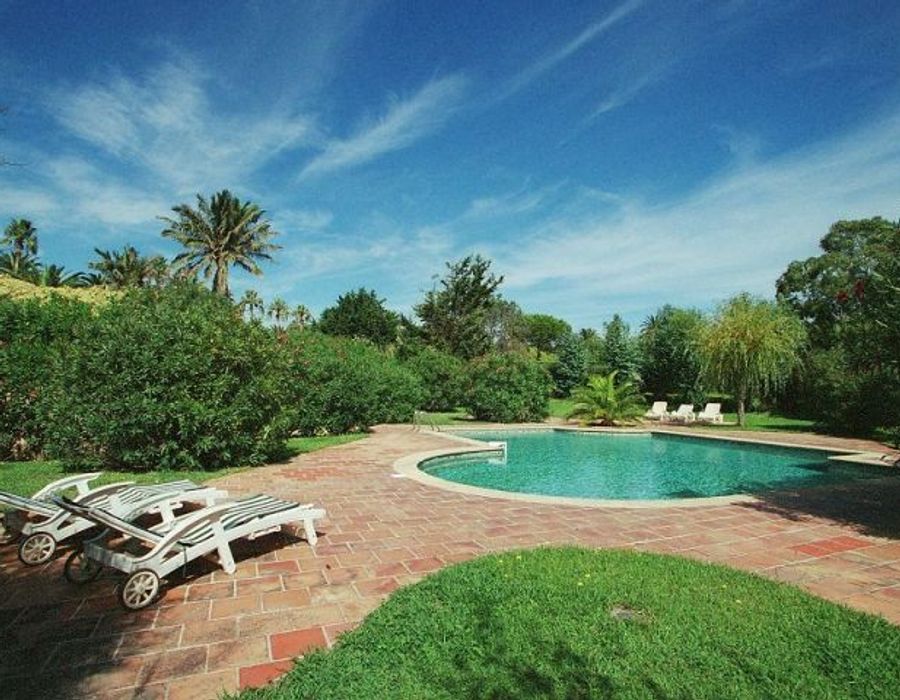 A pretty Provencal style property located in the private domain Les Parcs de la 3