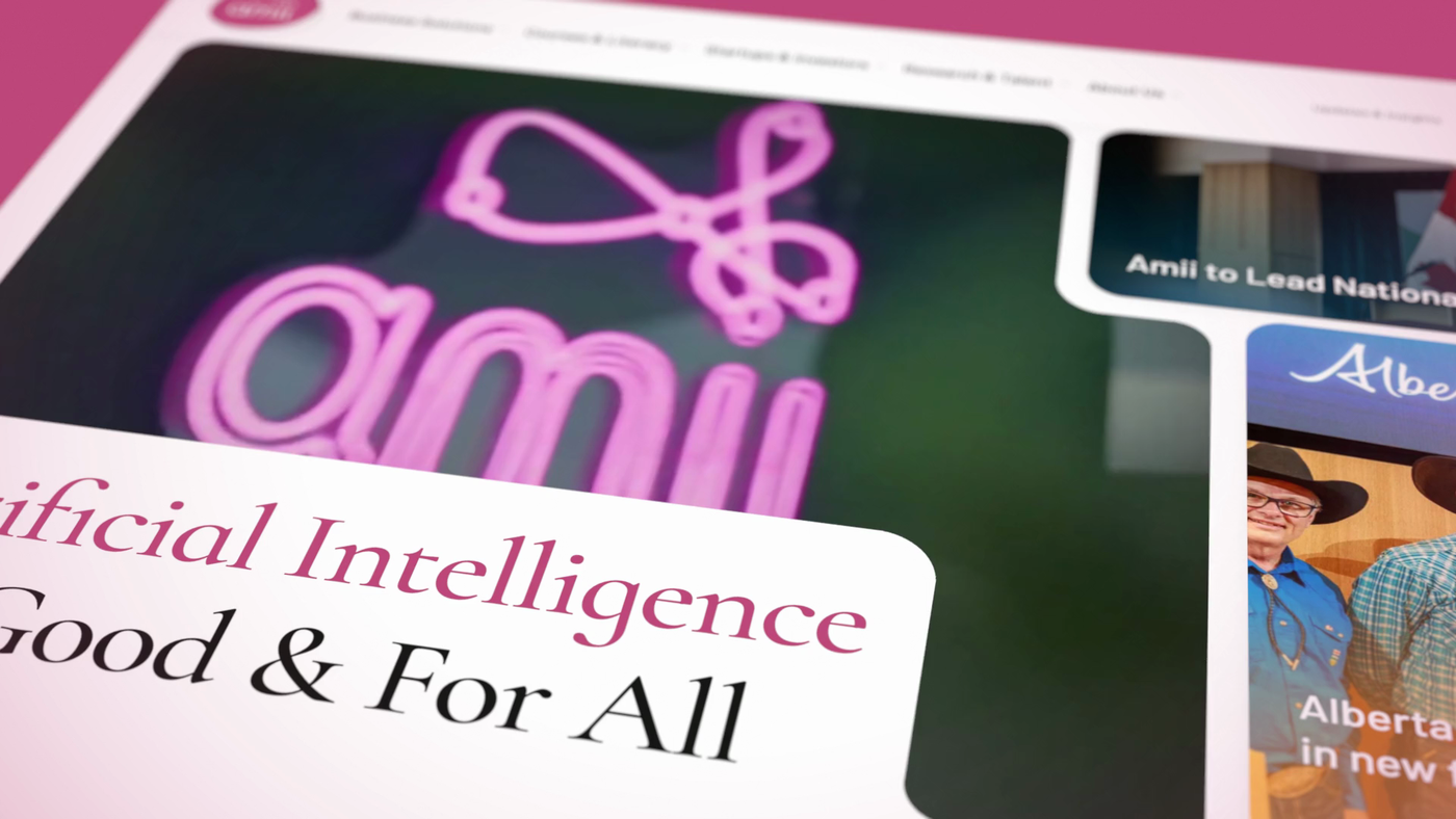 The new amii.ca homepage: the neon amii sign above Artificial Intelligence For Good & For All