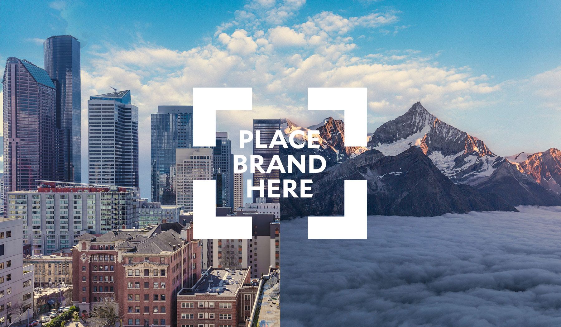 A city skyline joined to a mountain range, with “Place brand here” set in a white viewfinder frame.