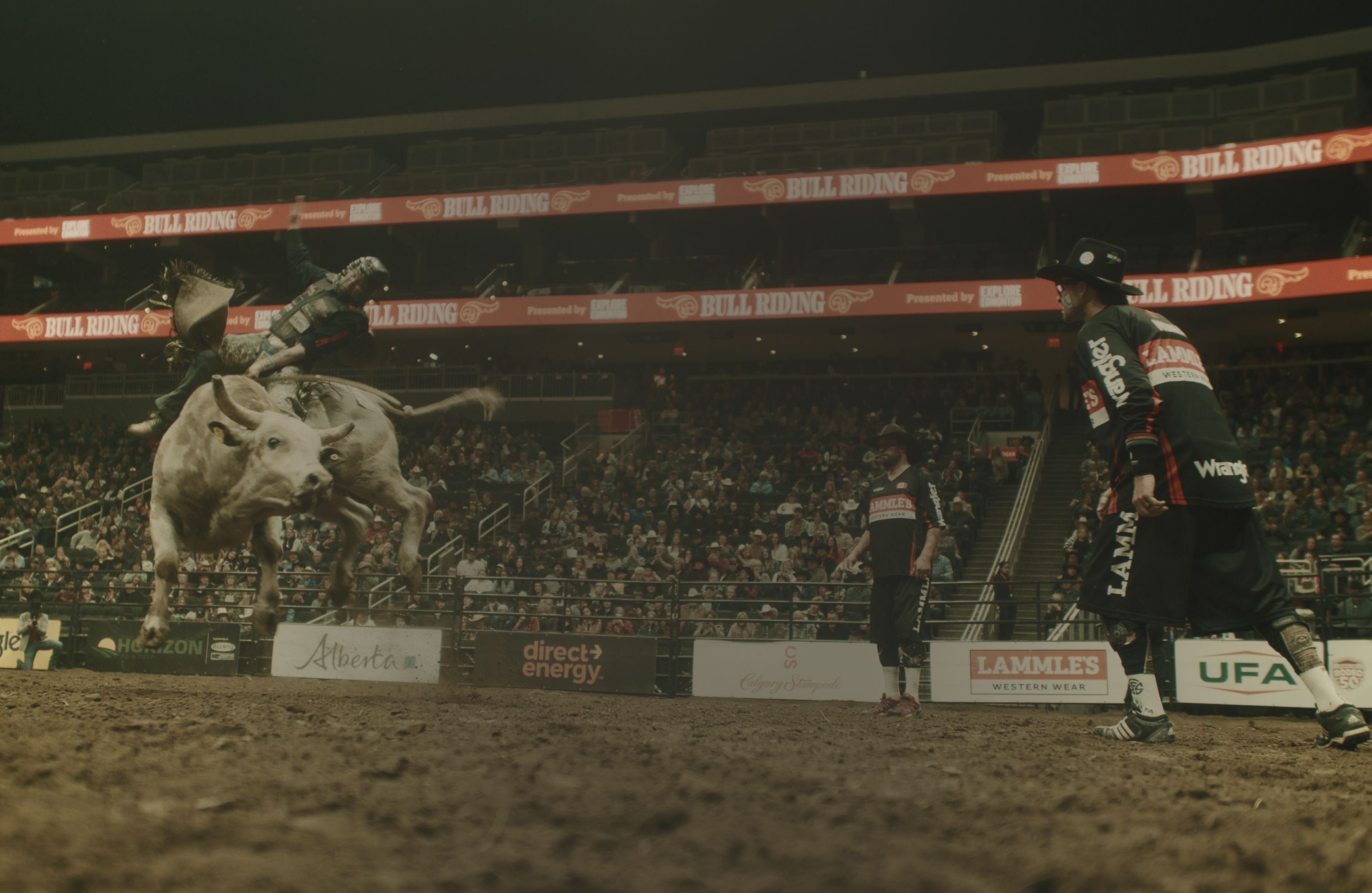 A bull rider in the arena at Rogers Place