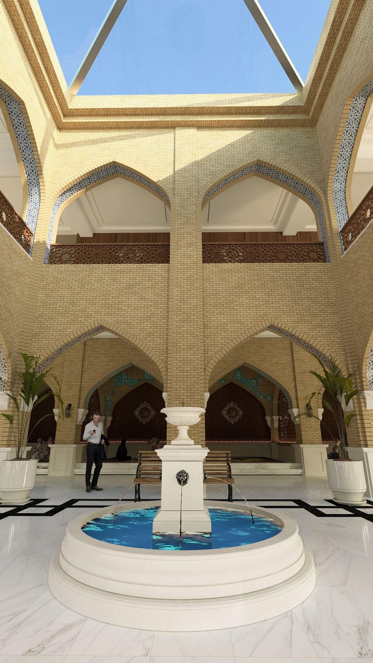 الفناء الداخلي والنافورة تحت السقف الزجاجي