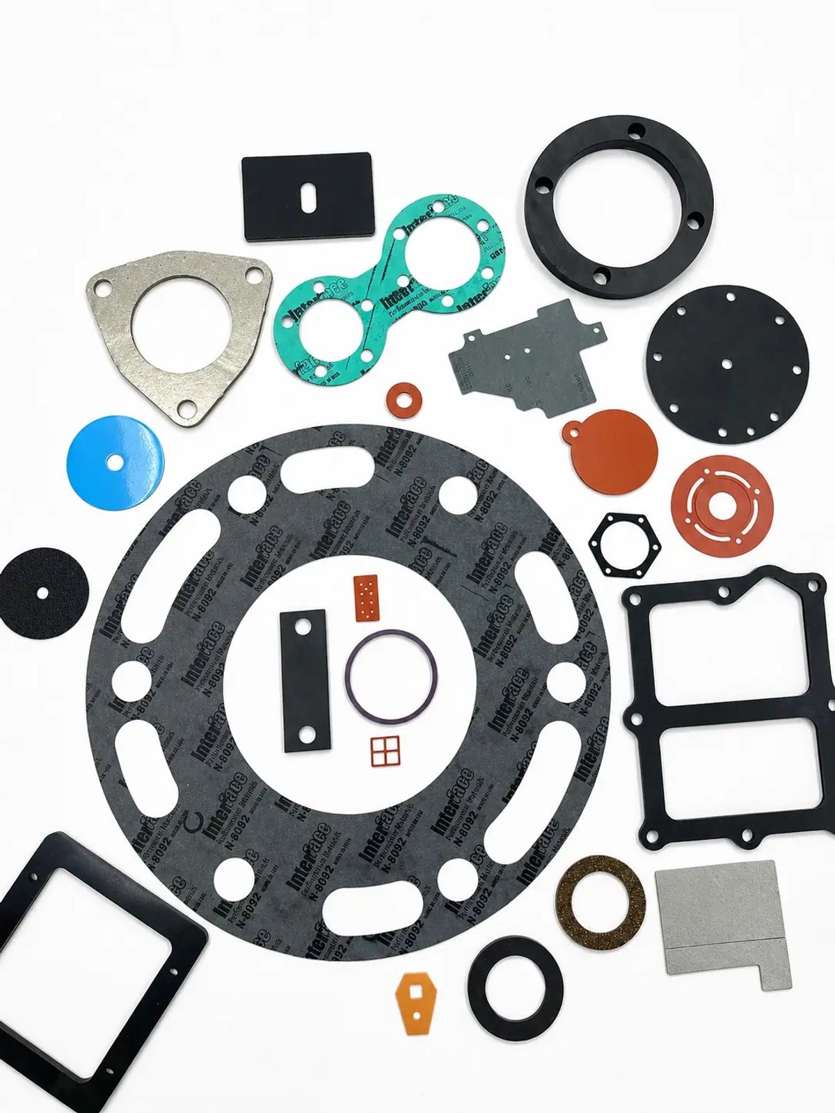 Assorted custom die-cut gaskets in rubber, foam, and fiber materials