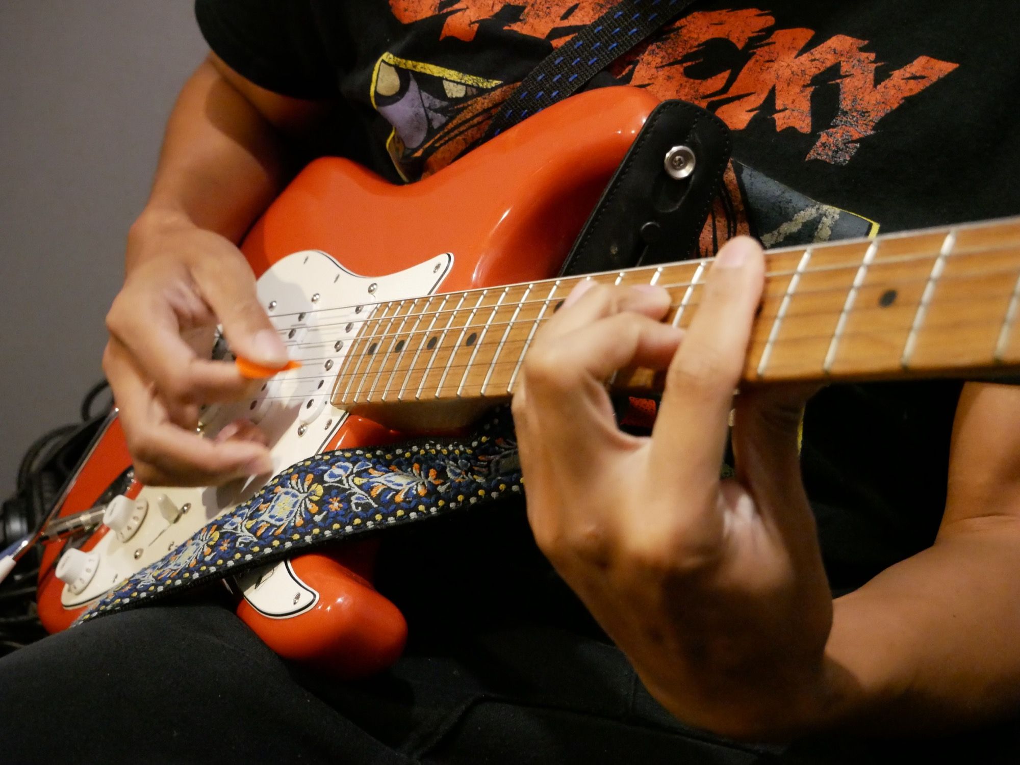Guitarist tracking a session in the Lab