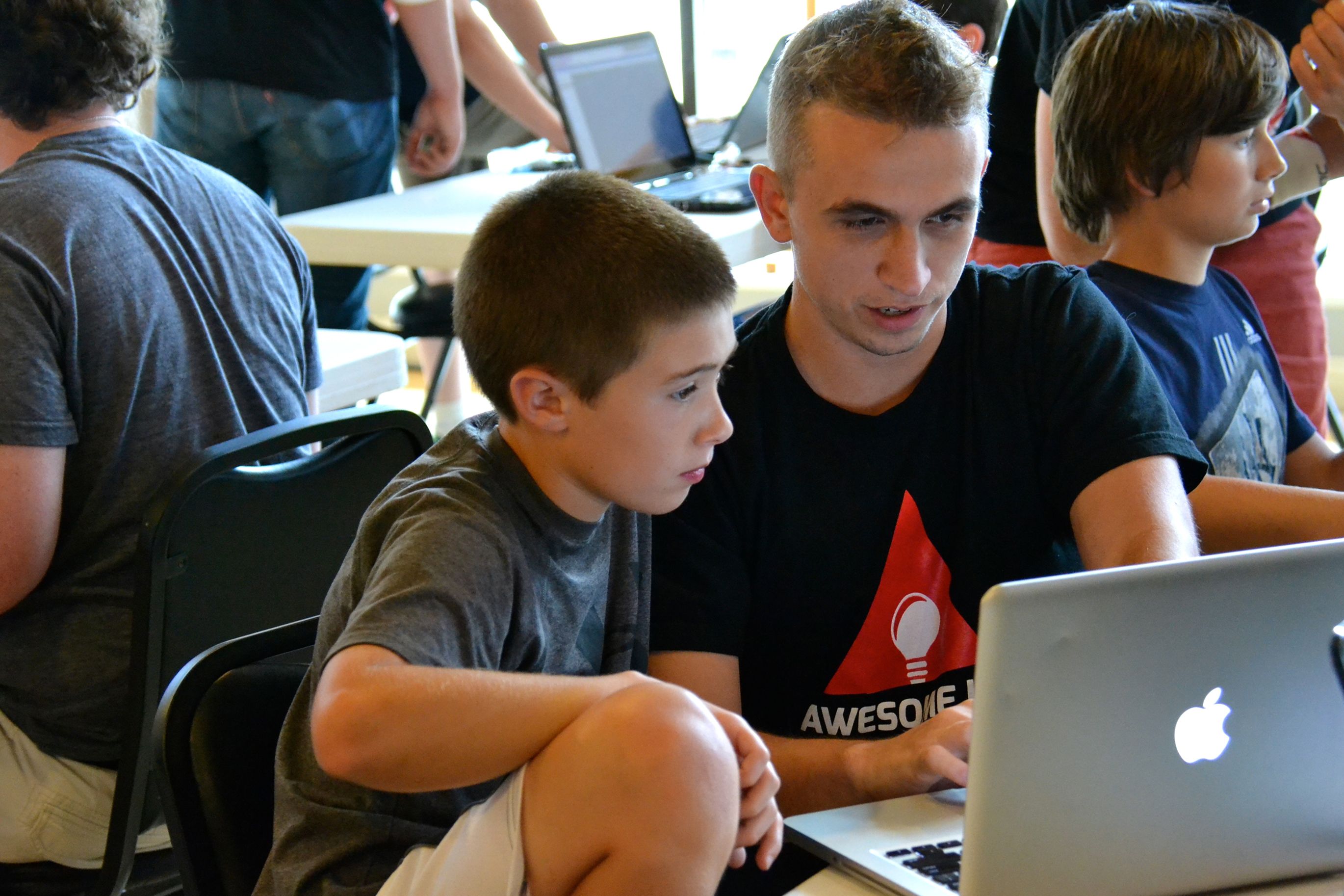 Awesome inc employee helping child