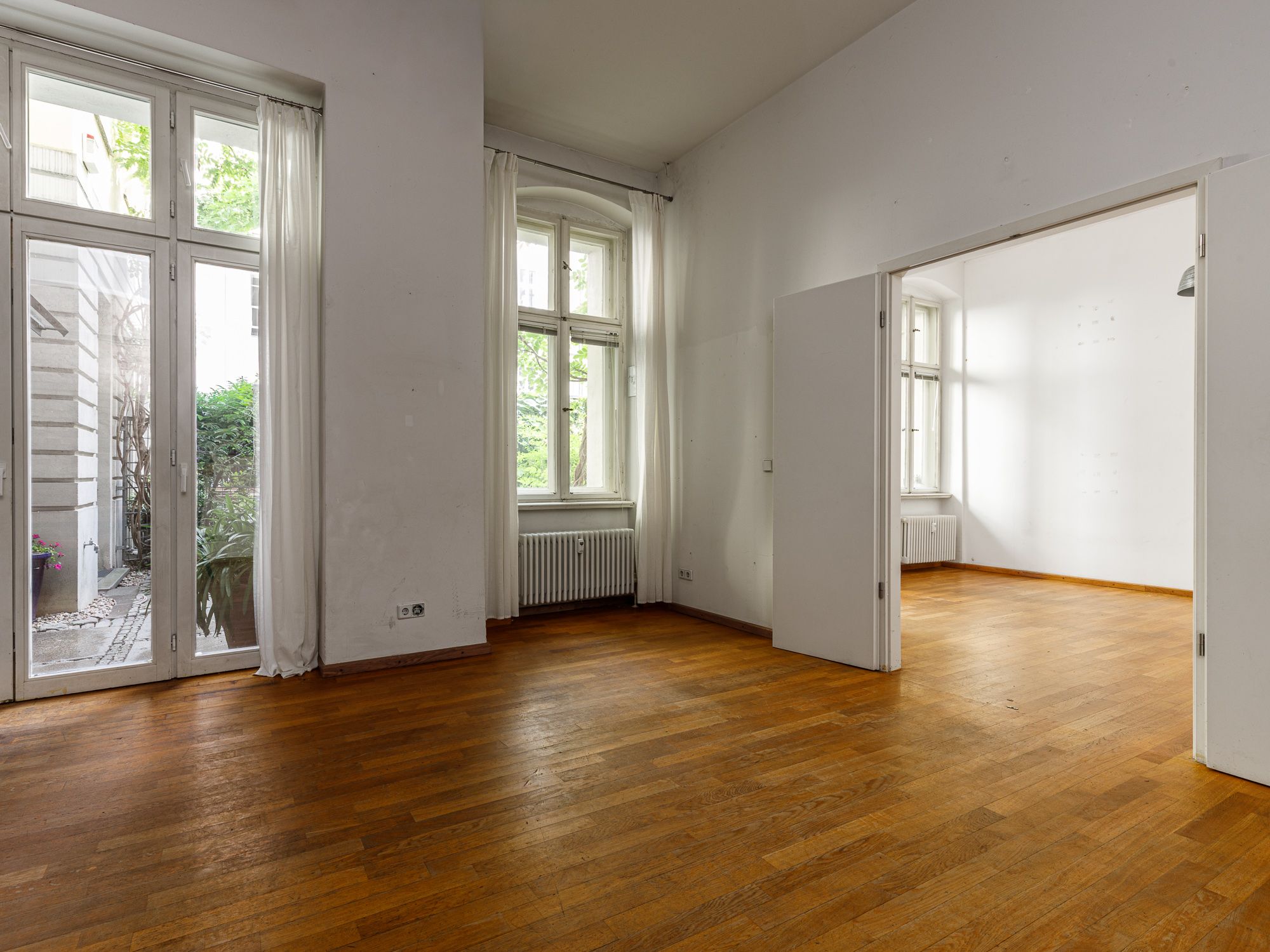 Wohnzimmer mit Erweiterungsmöglichkeit 