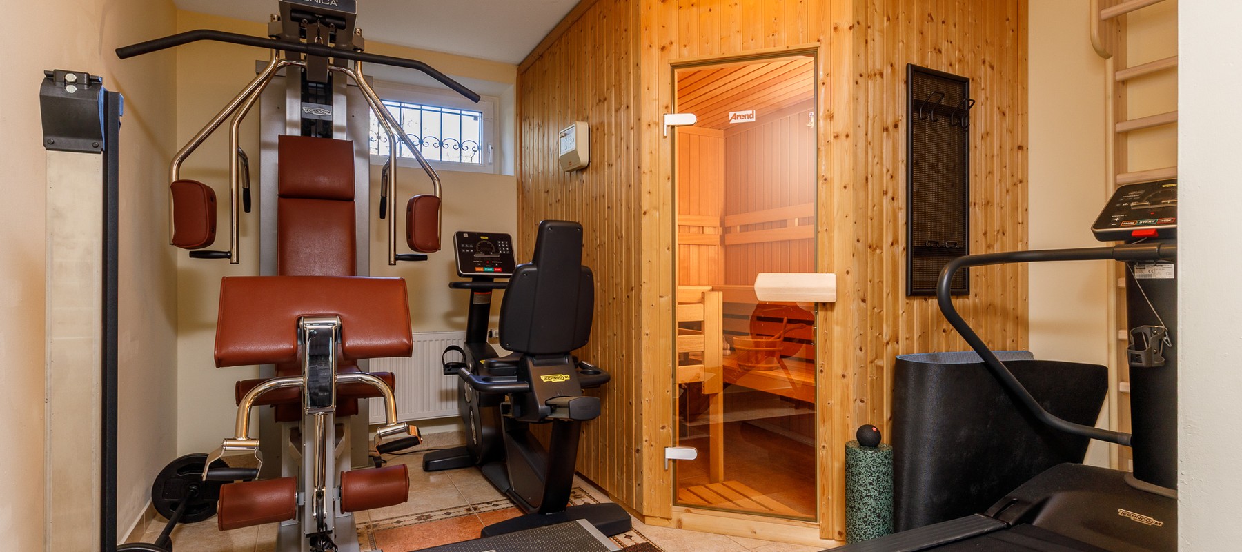 Spacious fitness area with Finnish sauna Spacious fitness area with Finnish sauna