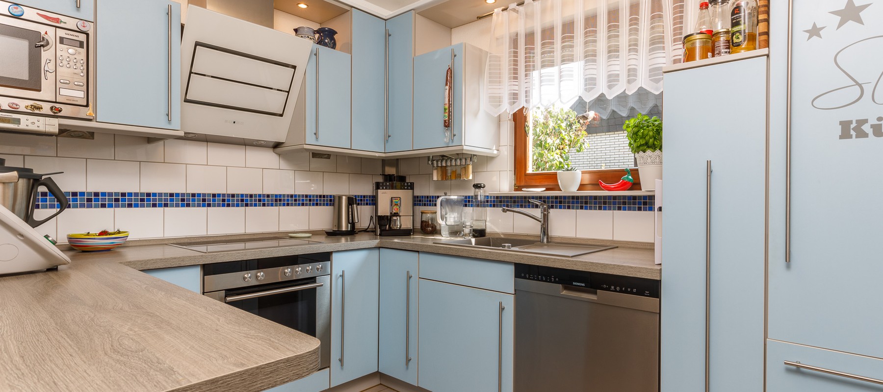 Separater Küchenbereich mit Vollausstattung Separater Küchenbereich mit Vollausstattung