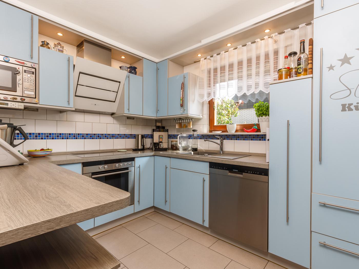 Separater Küchenbereich mit Vollausstattung Separater Küchenbereich mit Vollausstattung