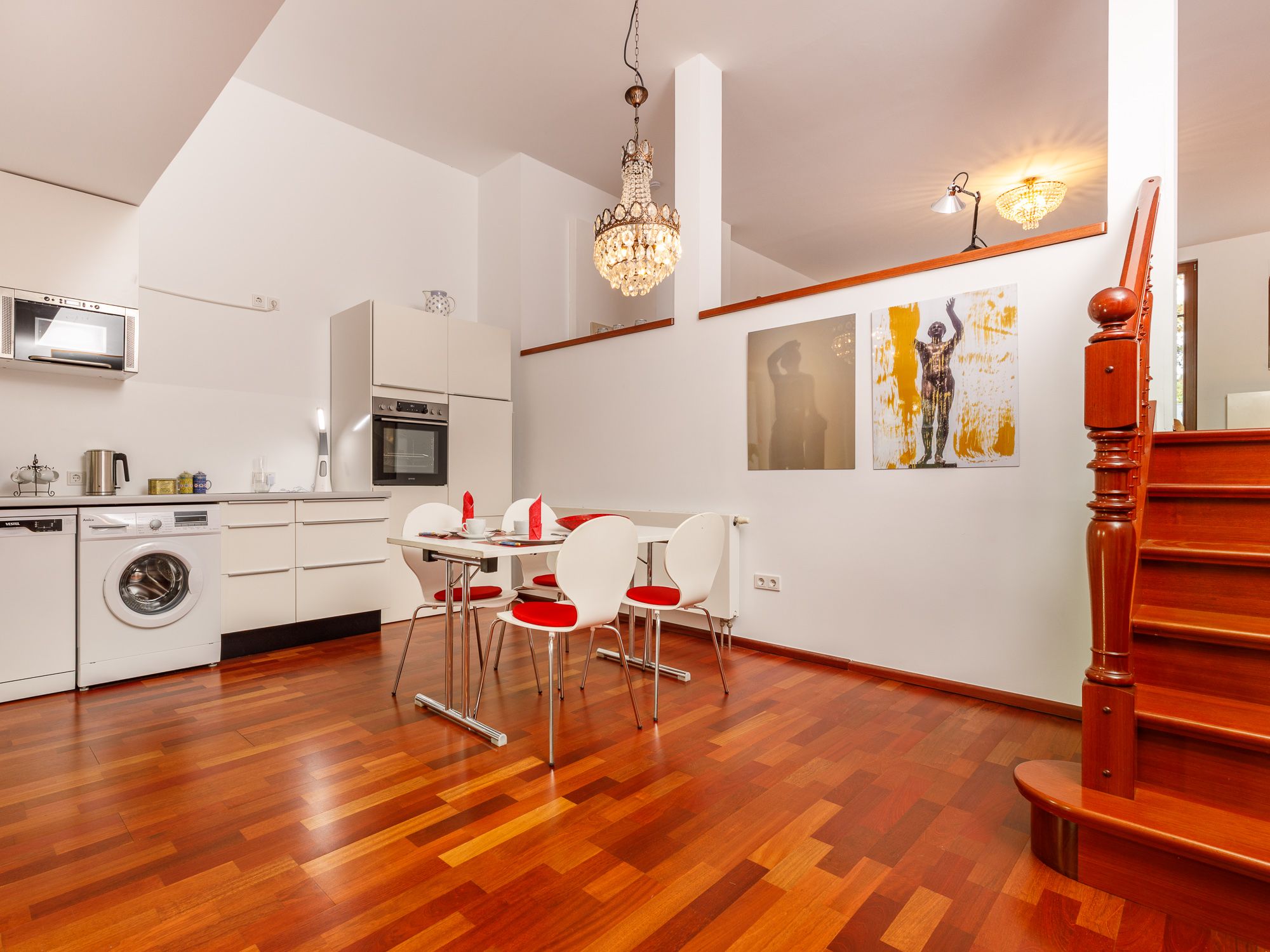 Open dining area with fitted kitchen