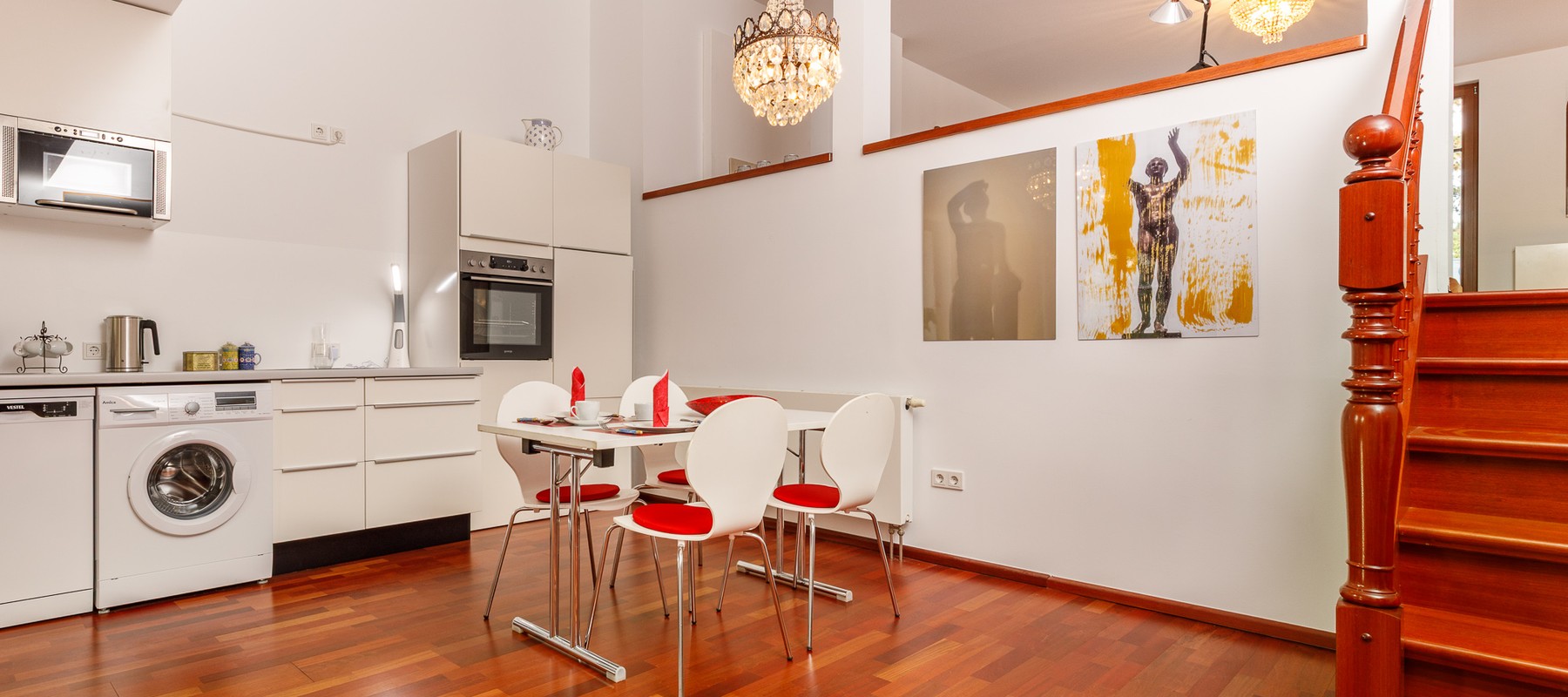 Open dining area with fitted kitchen Open dining area with fitted kitchen