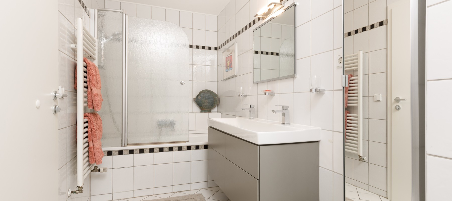 Bathroom with bathtub and double vanity Bathroom with bathtub and double vanity