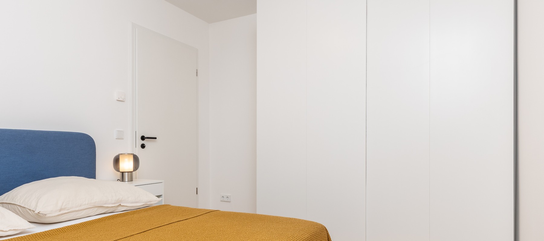 Bedroom with large wardrobe Bedroom with large wardrobe