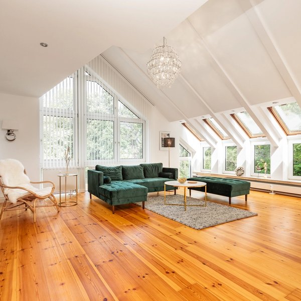 Living Area Windows Couch Wooden Floorboards