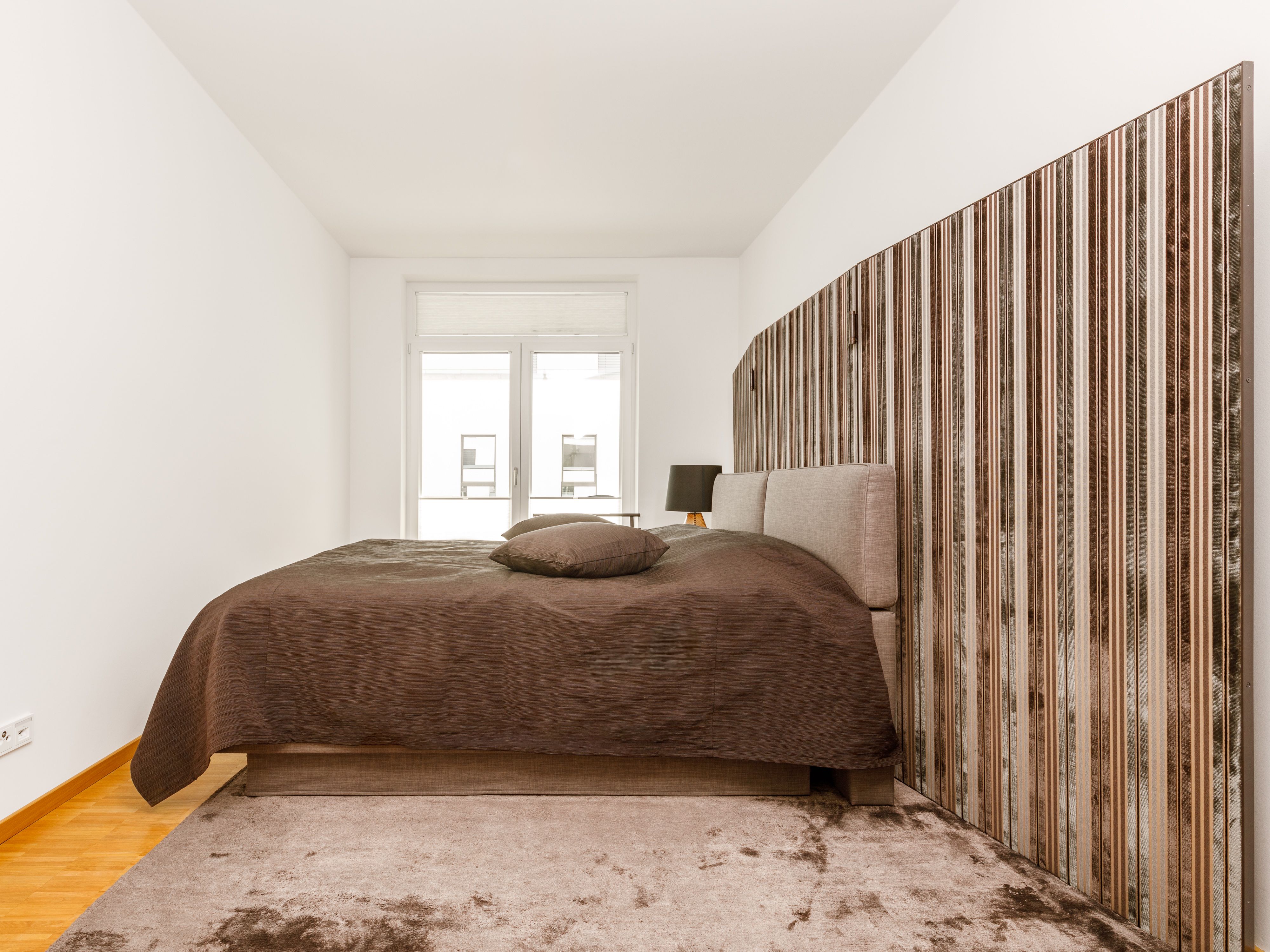 Schlafzimmer mit Balkonzugang