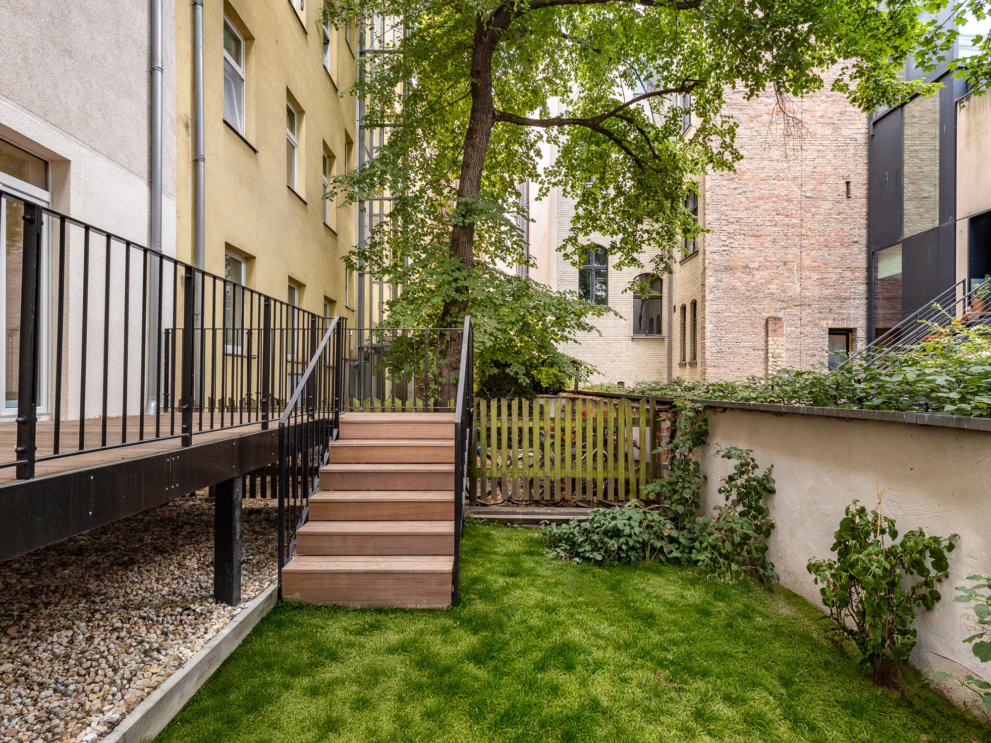 Stylish garden terrace with private lawn area