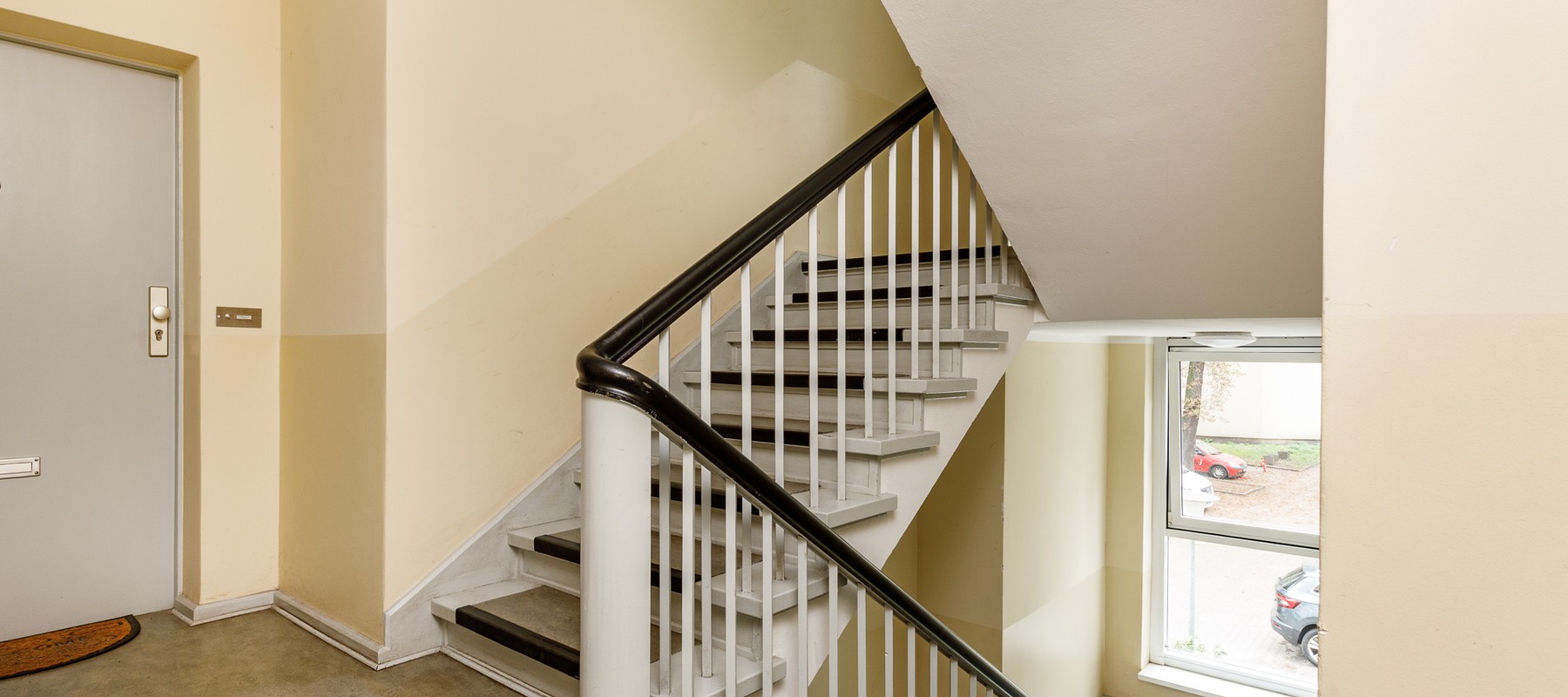 Well-maintained stairwell with linoleum flooring Well-maintained stairwell with linoleum flooring