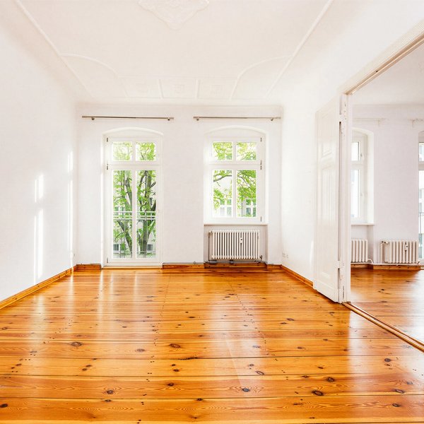 Living room wooden floor double doors balcony