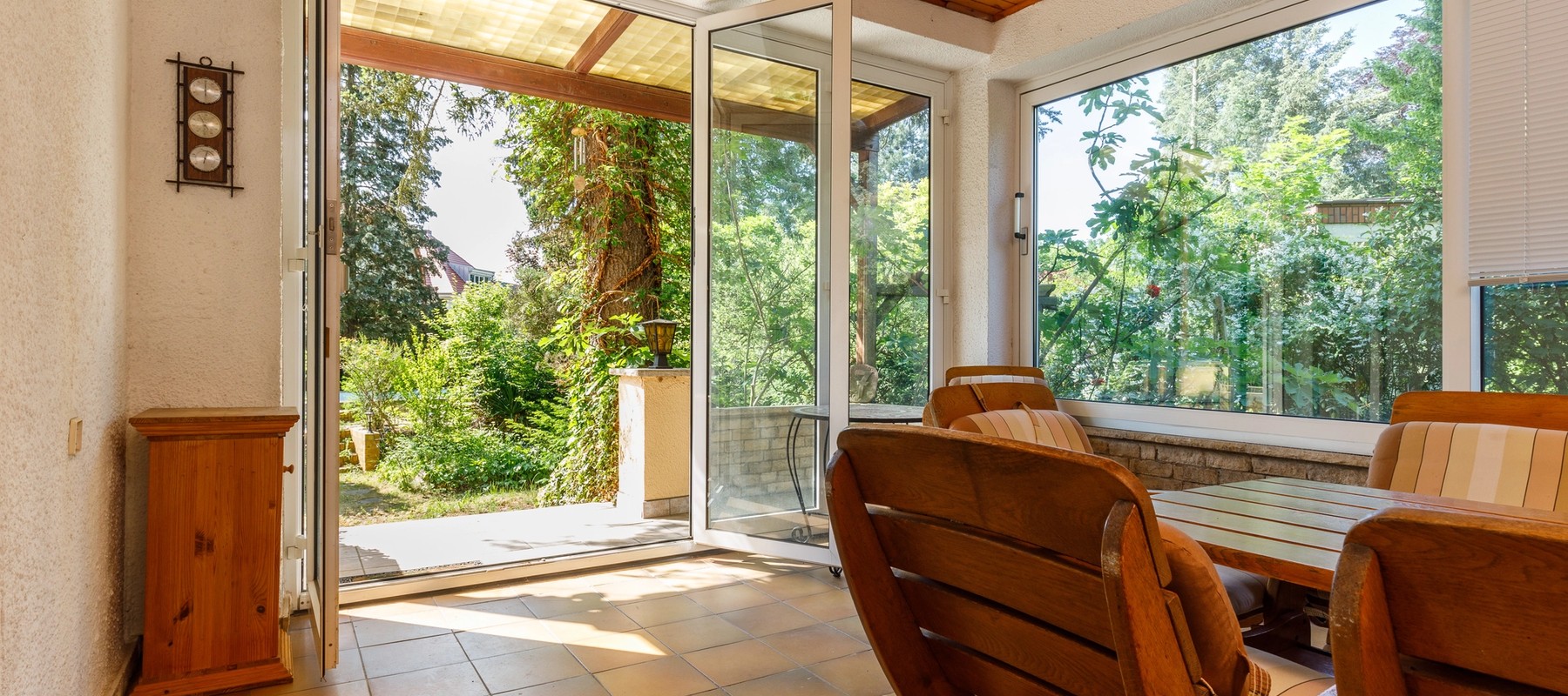 Wintergarten mit Zugang zur Terrasse Wintergarten mit Zugang zur Terrasse