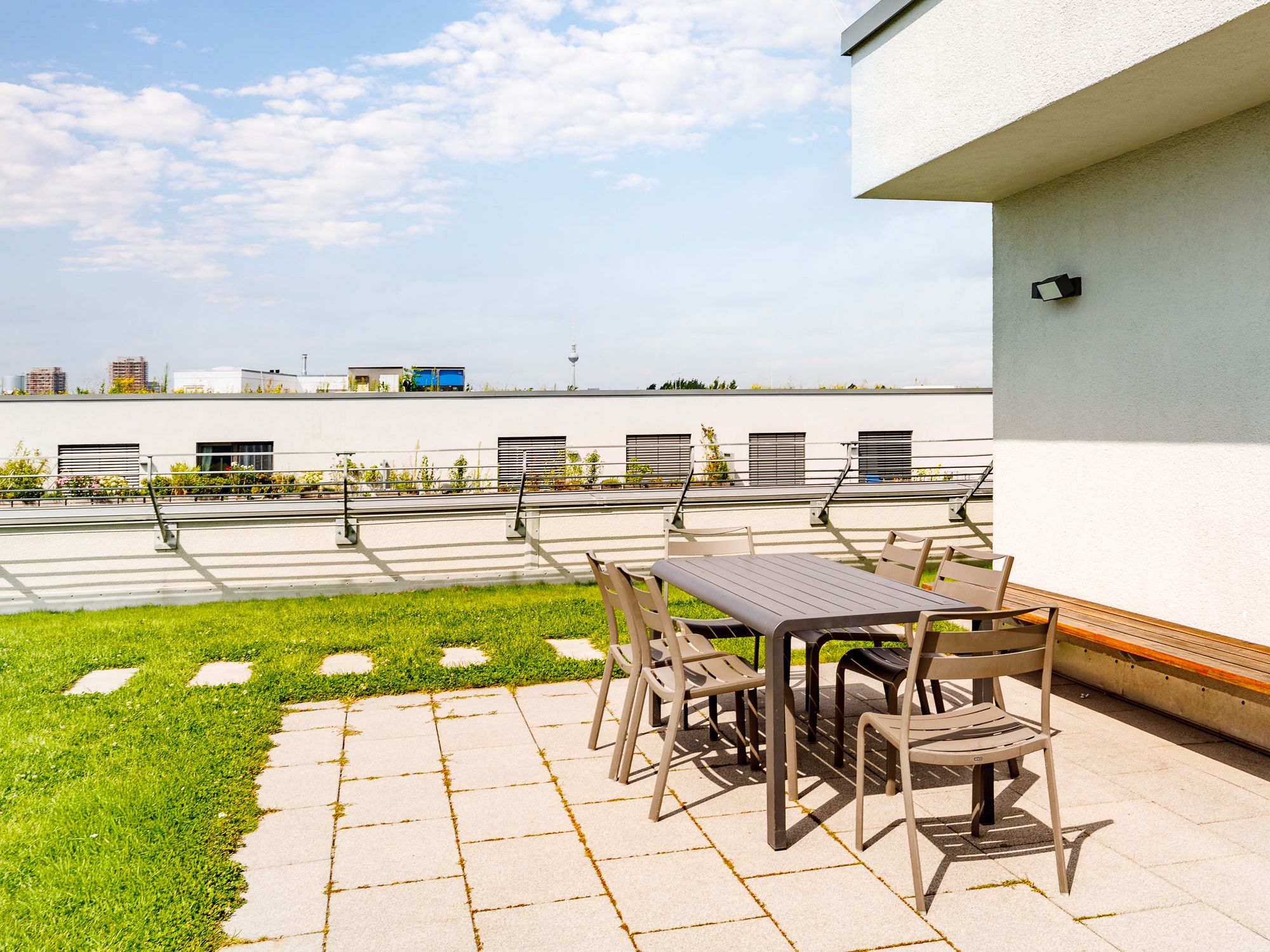 Rooftop terrace with barbecue and dining area 