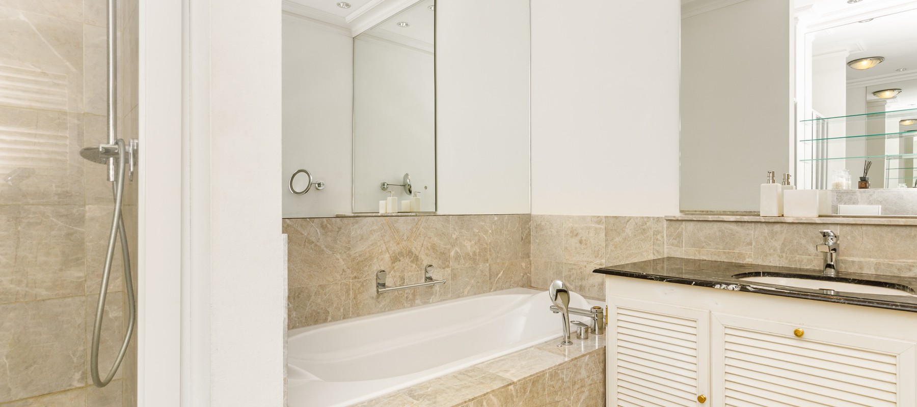 Full bathroom with separate shower and bathtub Full bathroom with separate shower and bathtub