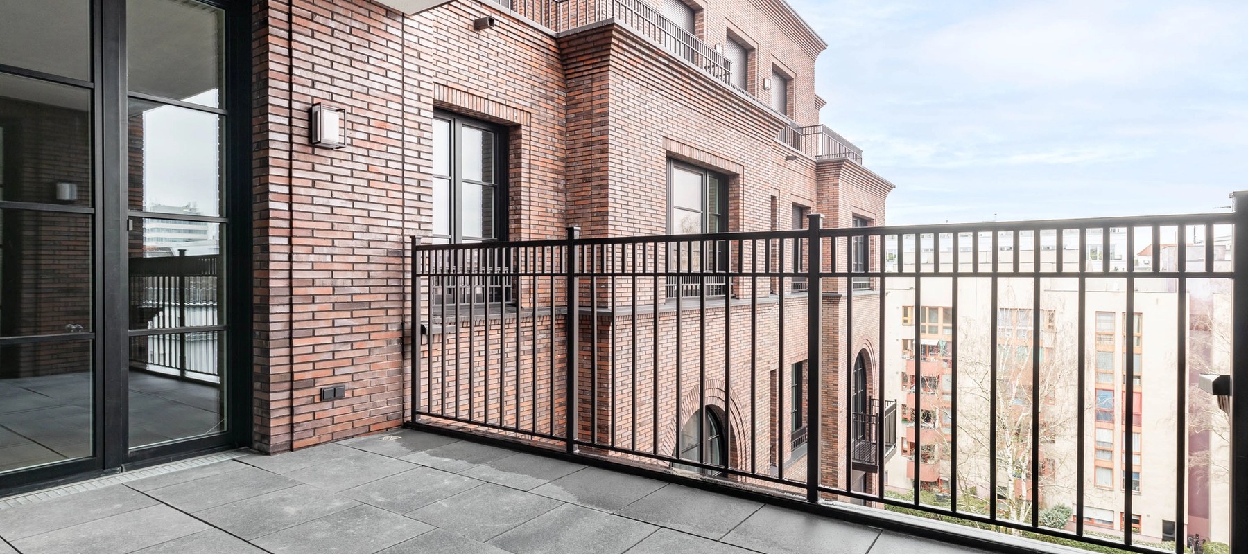 Large south-facing loggia with a view of the inner courtyard Large south-facing loggia with a view of the inner courtyard