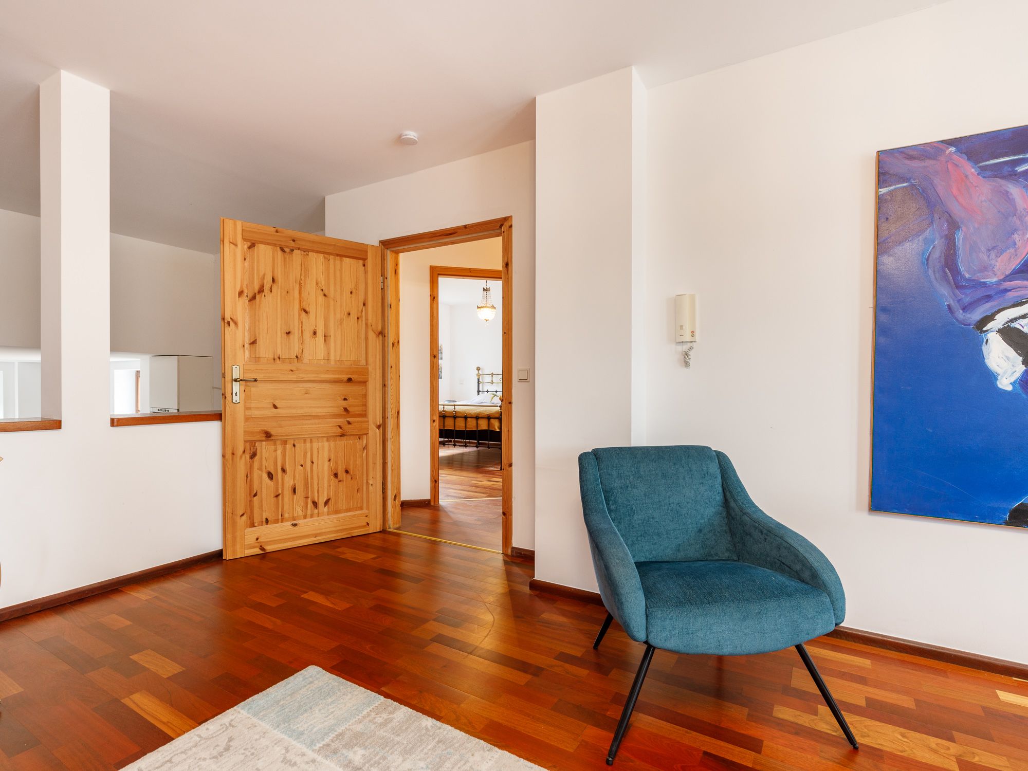 Living area with access to adjoining room