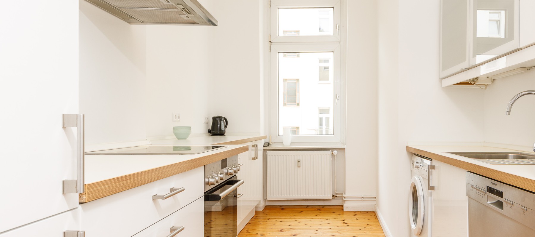 Separate kitchen area with appliances Separate kitchen area with appliances