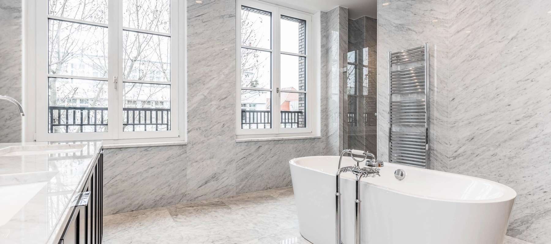 Modern bathroom with walk-in shower and view of the countryside Modern bathroom with walk-in shower and view of the countryside