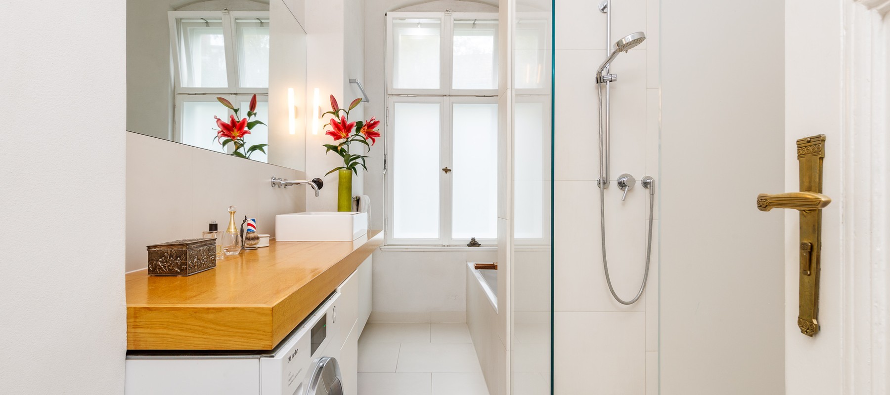 Daylight-filled shower room with walk-in rain shower Daylight-filled shower room with walk-in rain shower