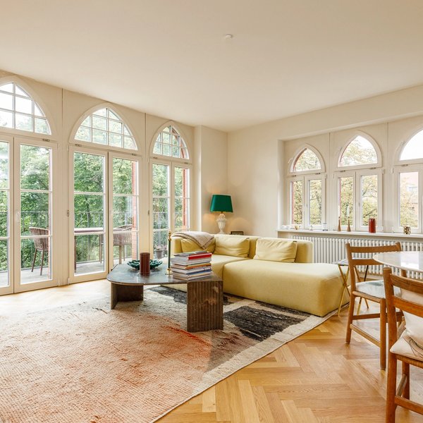 living room dining area arched windows