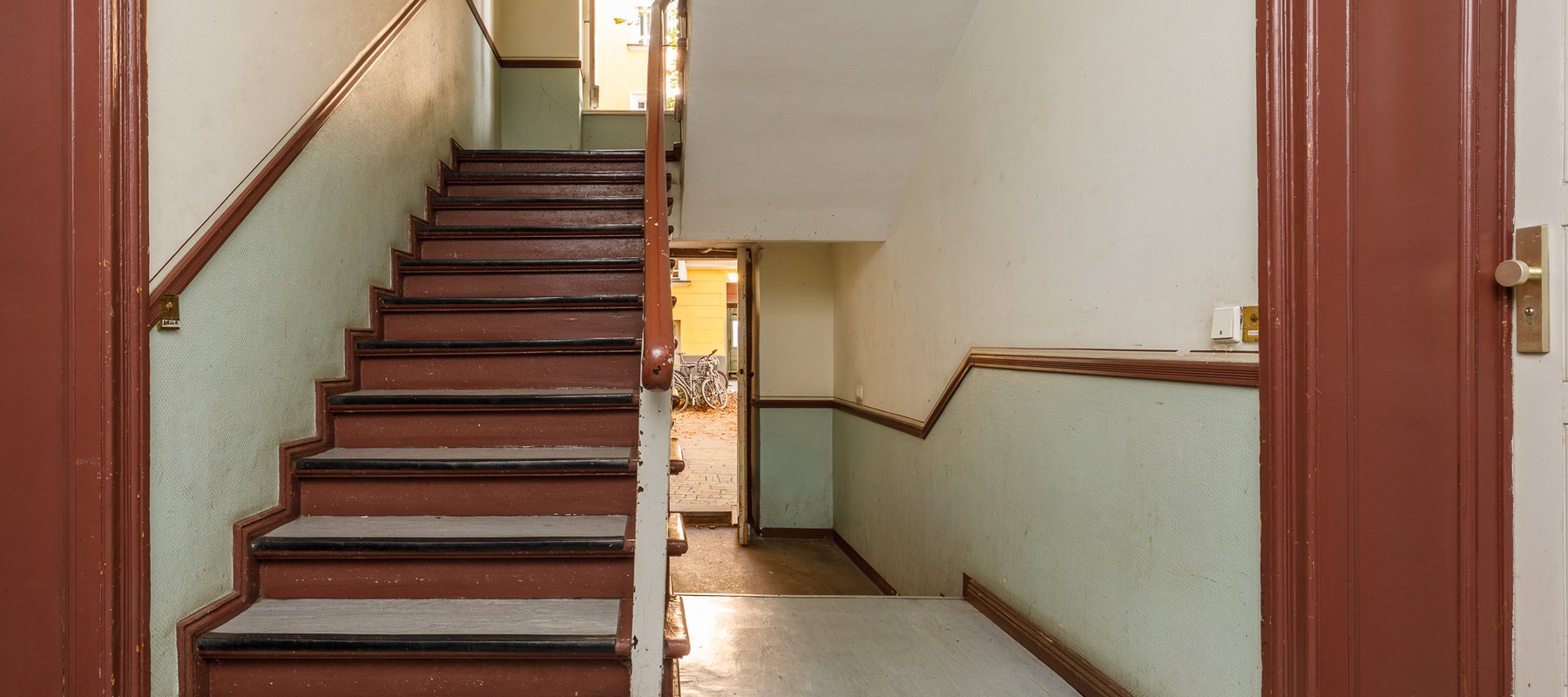 Well-maintained staircase with linoleum flooring Well-maintained staircase with linoleum flooring