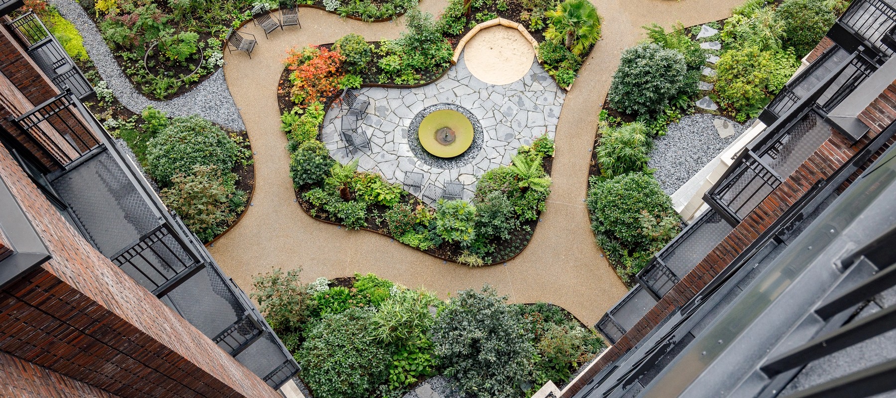 View of the idyllic courtyard with water feature View of the idyllic courtyard with water feature