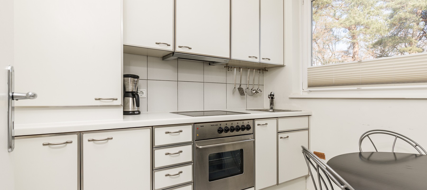 Separater Küchenbereich mit Vollausstattung Separater Küchenbereich mit Vollausstattung