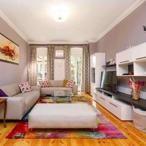 Wohnzimmer Ecksofa Dielenboden Terrassenzugang