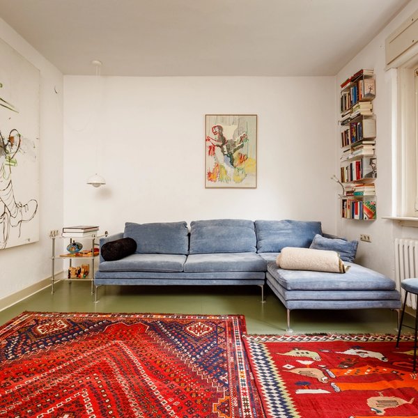 Wohnzimmer Ecksofa Kunstwerke Teppich