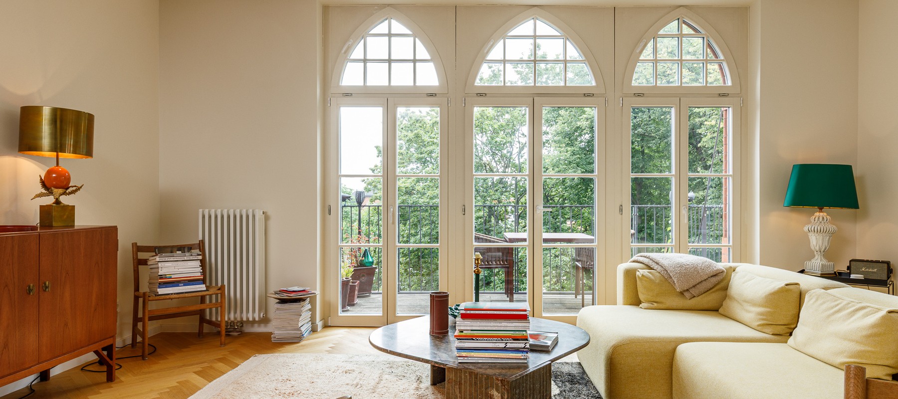 Living area with large window sections and balcony Living area with large window sections and balcony