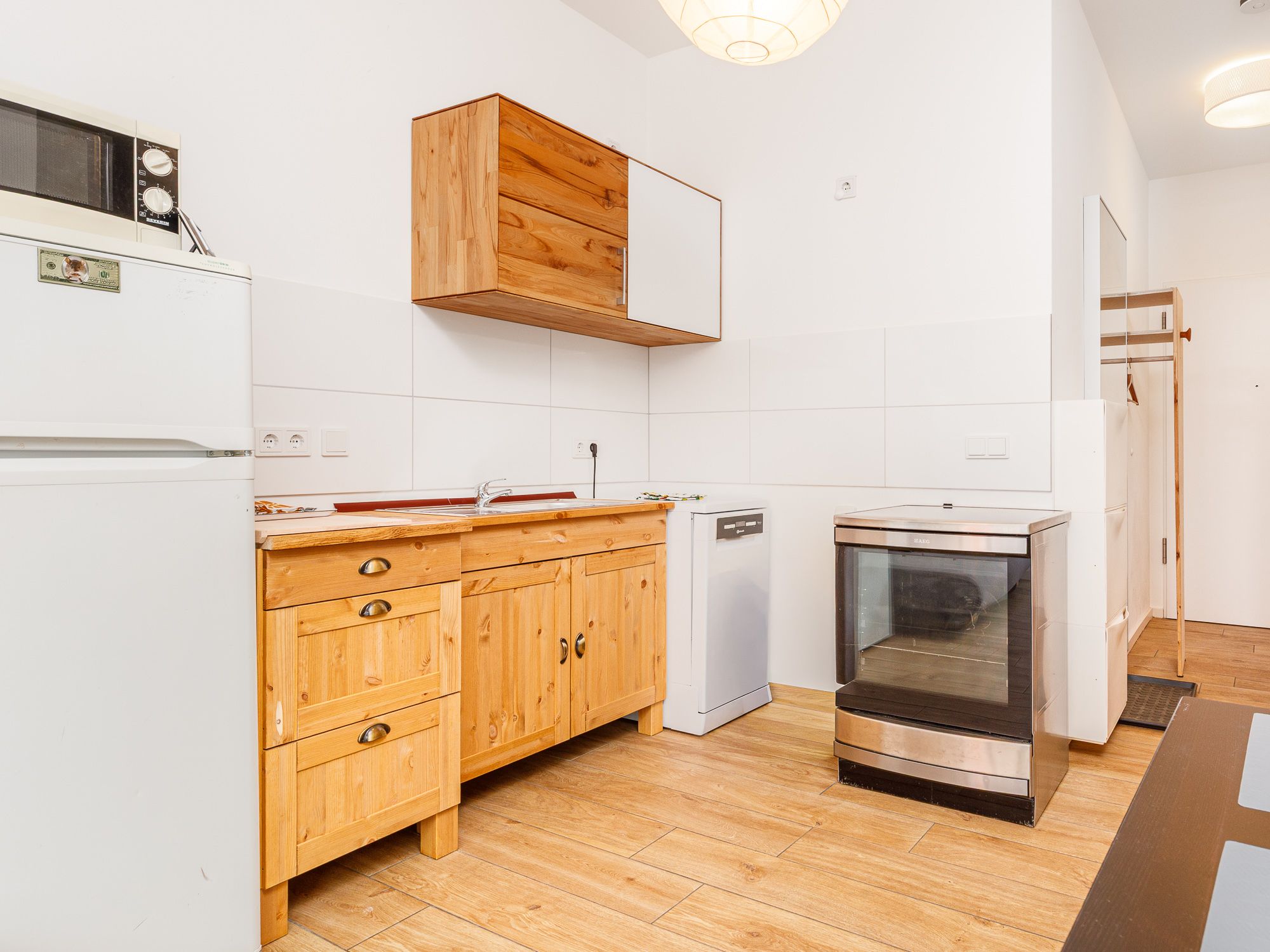 Open-plan kitchen with some appliances 