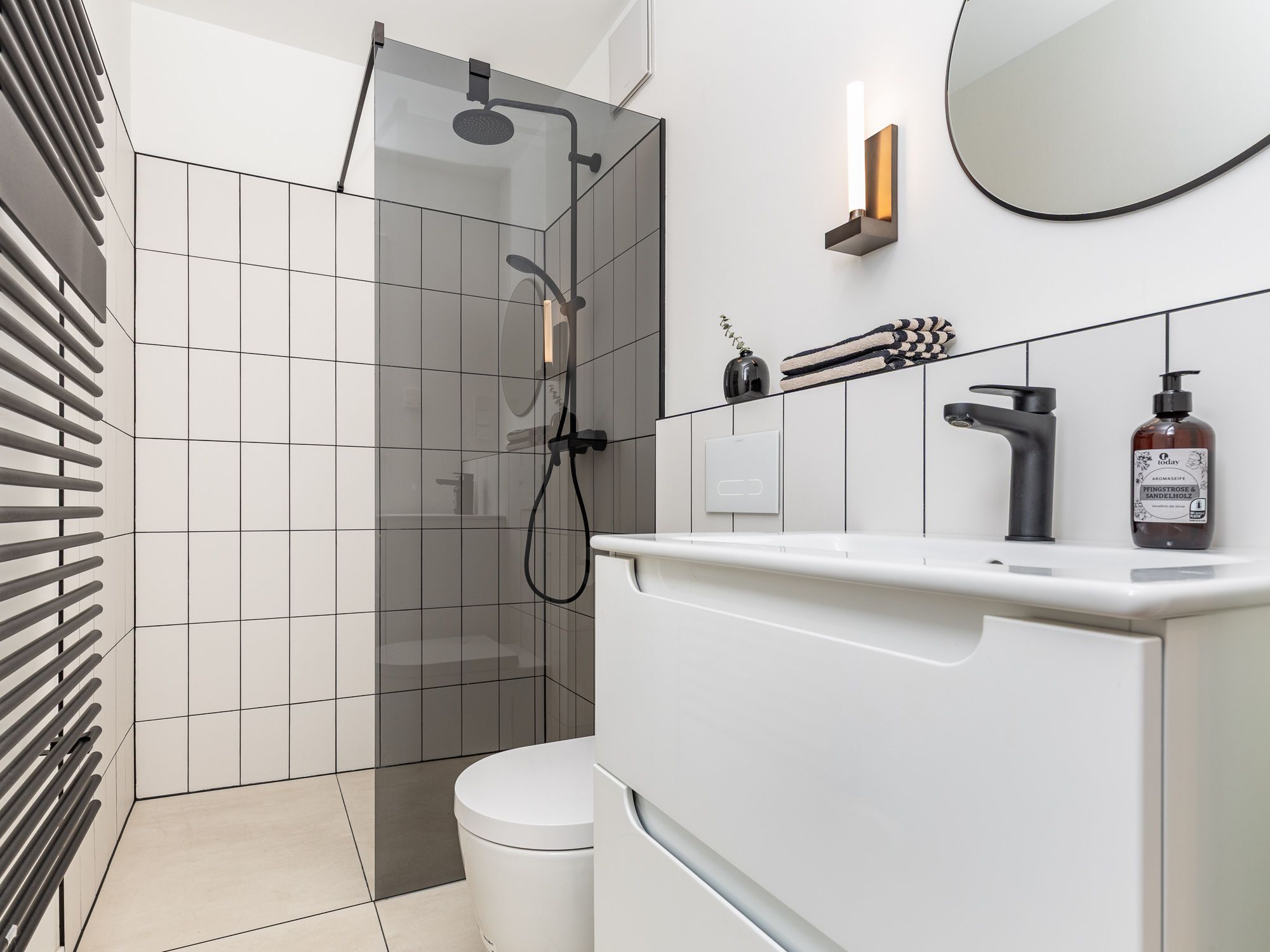 Modern bathroom with walk-in rain shower 