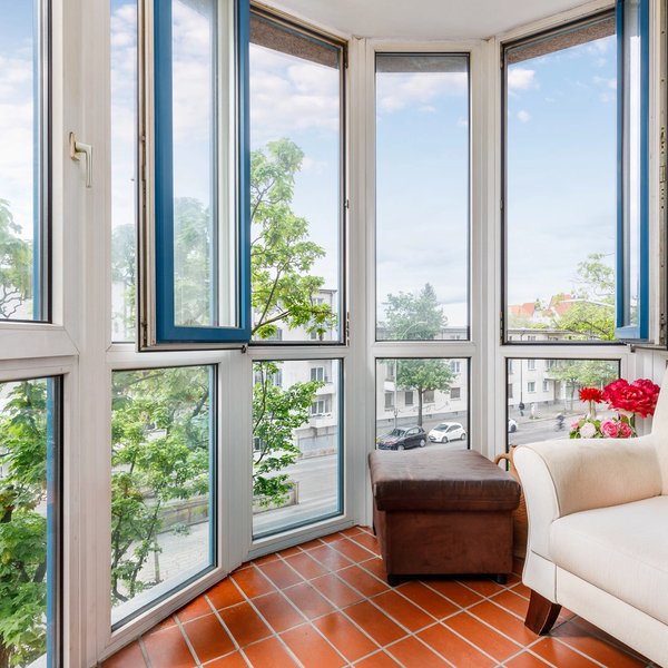 Sunroom windows armchair view tiles