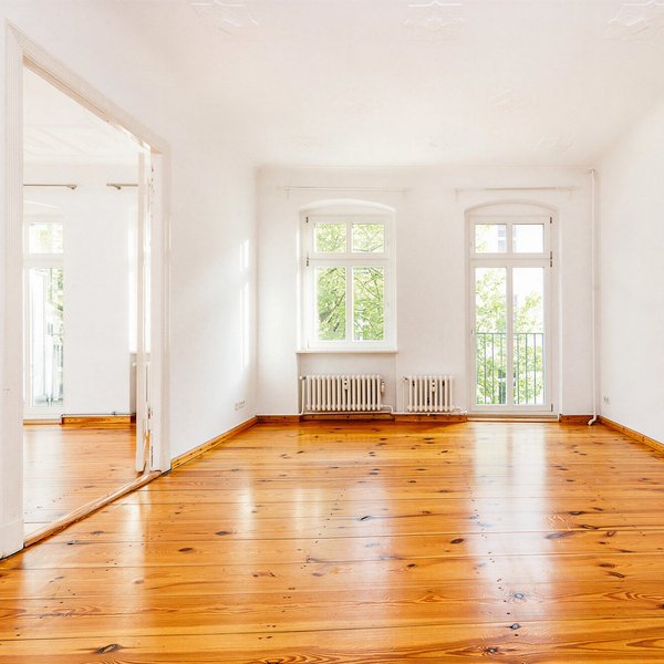 Period living room wooden floor double doors