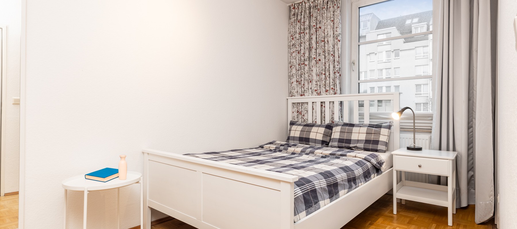 Charming bedroom with parquet flooring Charming bedroom with parquet flooring