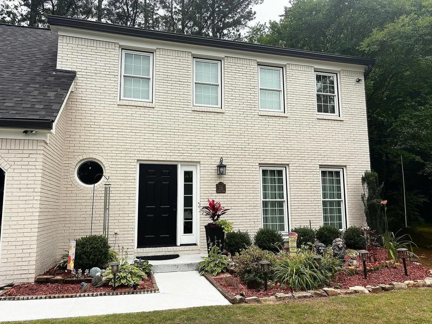 Cream painted brick colonial in Buckhead by OVO Painting