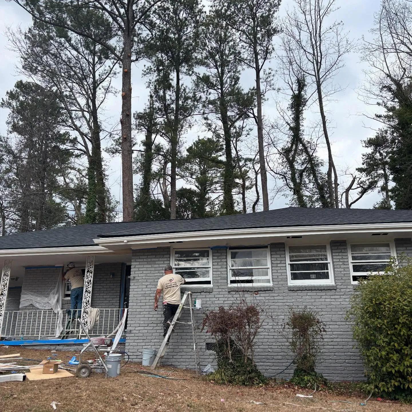 OVO Painting team brick painting in progress in Alpharetta