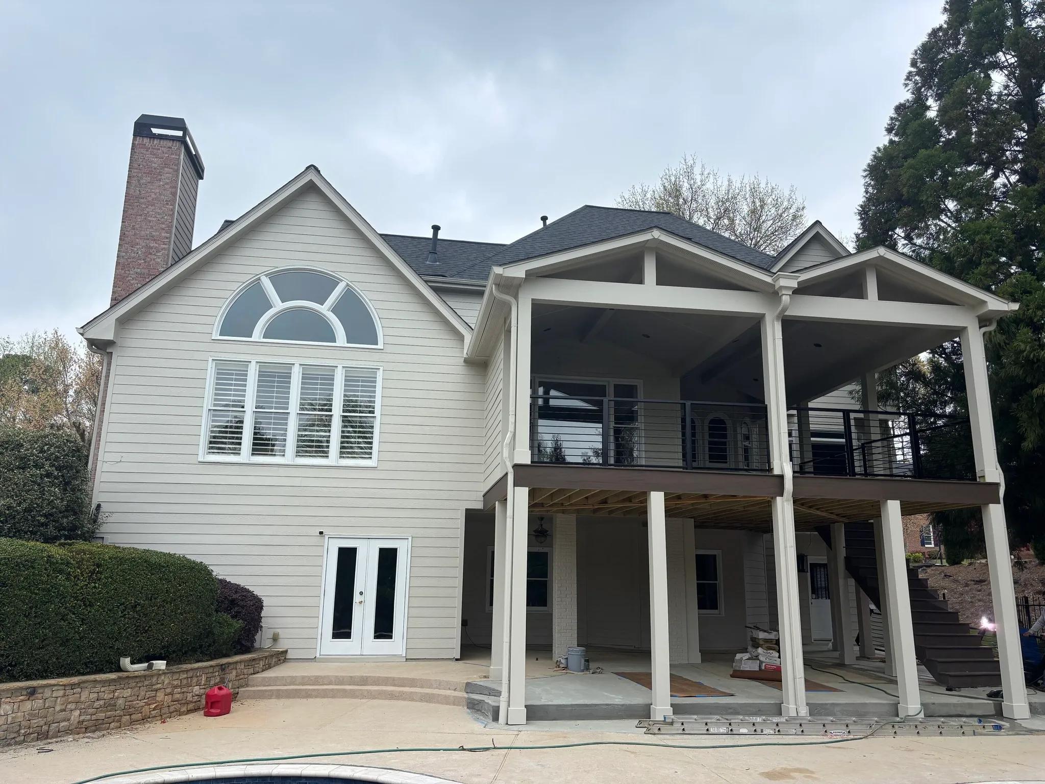Cream siding exterior in Dunwoody by OVO Painting