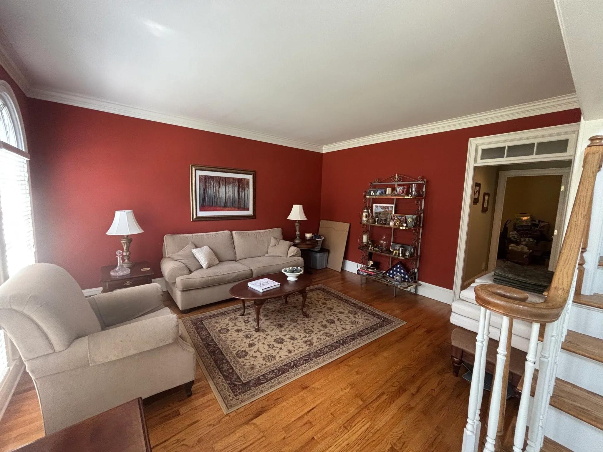 Bold red accent room painted by OVO Painting in Buckhead